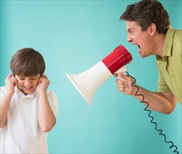 Father with megaphone yelling at son (8-9)