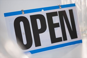 Close-up of open sign