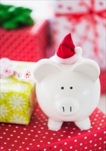 Piggy bank and christmas gifts