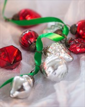 Christmas baubles wrapped in paper
