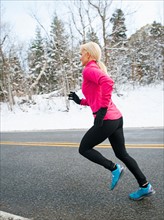Woman jogging in winter