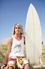 Portrait of male surfer