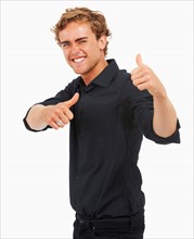 Studio Shot, Portrait of young man with thumbs up