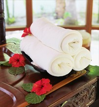 Rolled up towels in spa