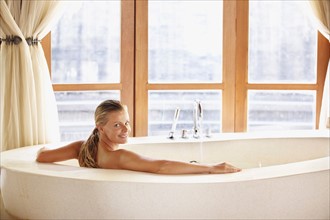 Woman enjoying bath spa