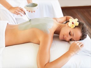 Woman receiving spa treatment