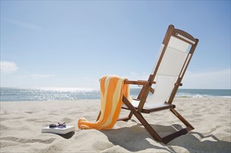 Sun chair on sandy beach