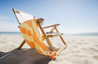 Sun chair on sandy beach