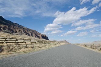 Road going through arid landscape