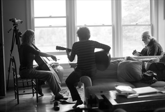 Three people playing together