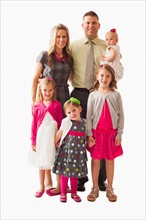 Portrait of family with four daughters (18-23 months, 2-3, 6-7)