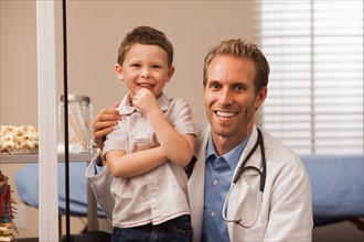 Pediatrician and boy (2-3)