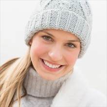 Portrait of young woman in winter clothing.