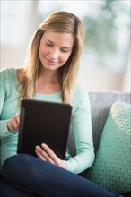 Woman using tablet pc.