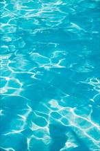 Water in swimming pool.
