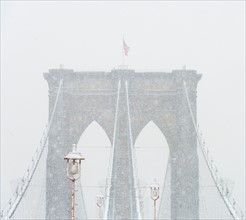 Brooklyn Bridge in winter. USA, New York State, New York.