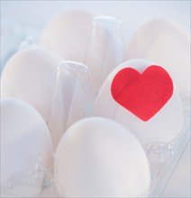 Studio Shot of eggs with red heart