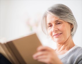 Portrait of woman reading