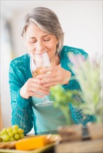 Portrait of woman holding wine glass
