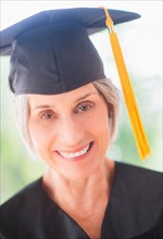 Portrait of woman in graduation cap
