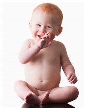 Studio shot of naked baby boy (18-23 months)