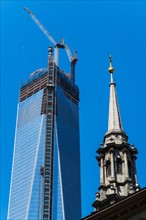 Freedom Tower and old steeple. New York City, New York.
