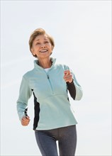 Senior woman jogging.