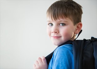 Portrait of boy (4-5) with backpack