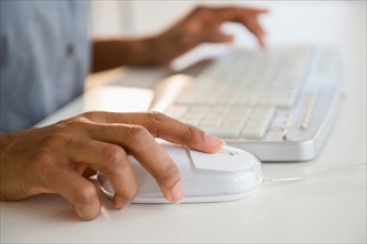 Close up of woman working on computer