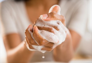 Close up of woman washing her hands