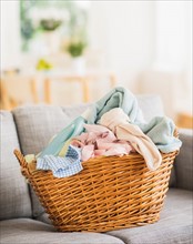 Laundry basket on sofa