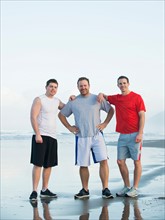 Portrait of men on beach