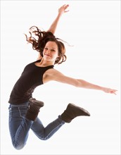 Portrait of jumping girl (12-13)