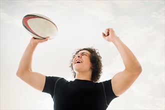 Portrait of rugby player celebrating victory
