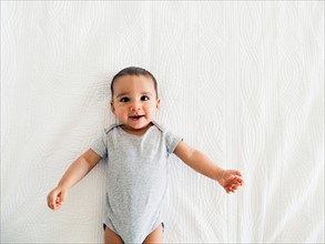 Baby boy (2-5 months) portrait on white