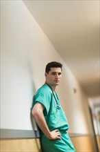 Doctor standing in hallway.