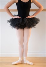 Portrait of teenage (16-17) ballet dancer practicing