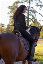 Beautiful woman horseriding