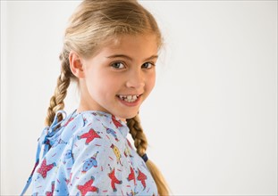 Portrait of blond girl (8-9) in hospital