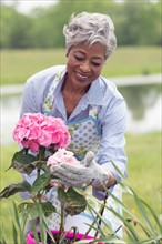 Senior woman working in garden