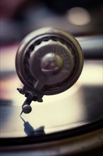 Studio close-up of record player.