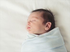 Portrait of newborn baby boy (0-1 months).