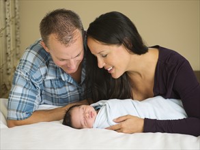 Portrait of family with newborn baby boy (0-11 months).