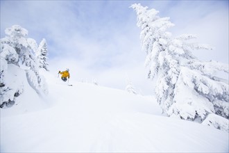 Man skiing. USA, Montana, Whitefish.
Photo : Noah Clayton