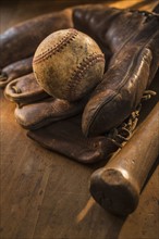 Antique baseball, glove and bat.