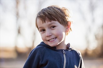 Portrait of smiling boy (4-5).
Photo : Maisie Paterson