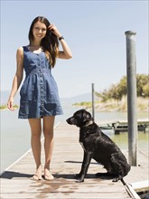 Woman with dog standing on jetty. Salt Lake City, Utah, USA.
Photo : Jessica Peterson