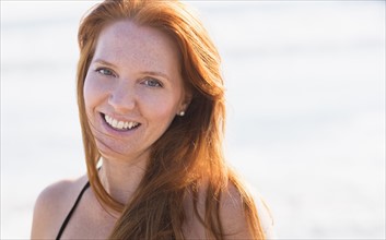 Portrait of woman on beach.