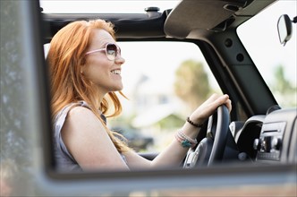 Woman sitting in car.