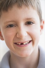 Portrait of boy (8-9) smiling.
